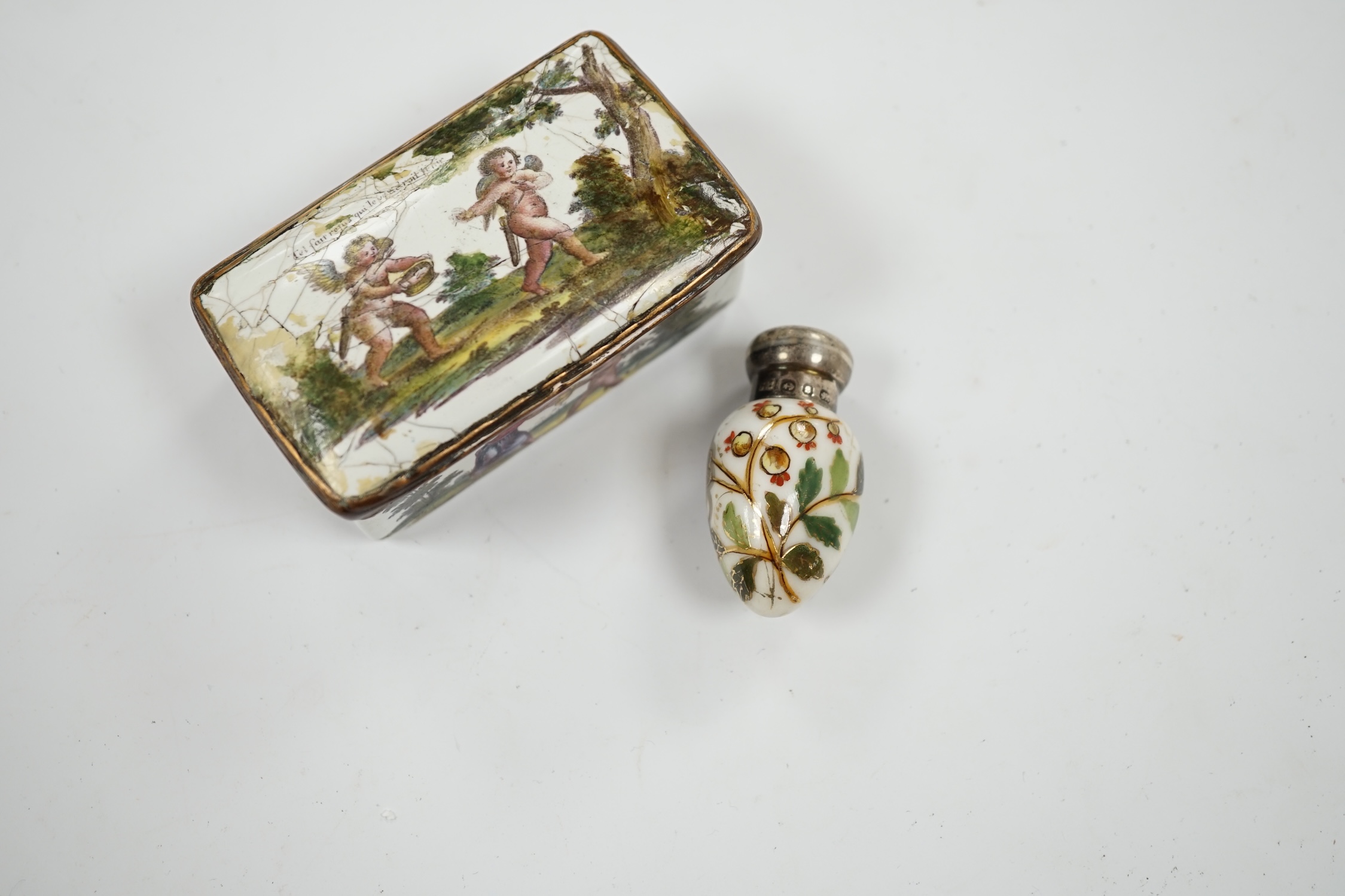 An 18th century French enamel snuff box and a late 19th century silver mounted porcelain scent bottle, largest 7.5cm. Condition - box poor, scent bottle fair